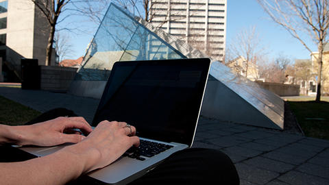 undergraduate working on laptop