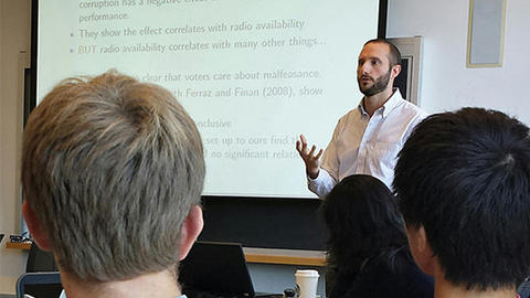faculty member speaking at event