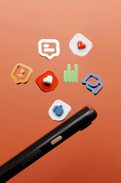 cell phone under social react and chat icons