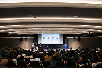 View from the audience of a panel discussion at the Dataverse Community Meeting 2026