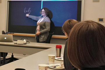 faculty member speaking at event
