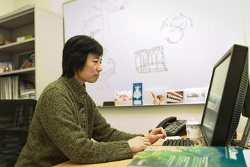 Wendy Guan at her desk